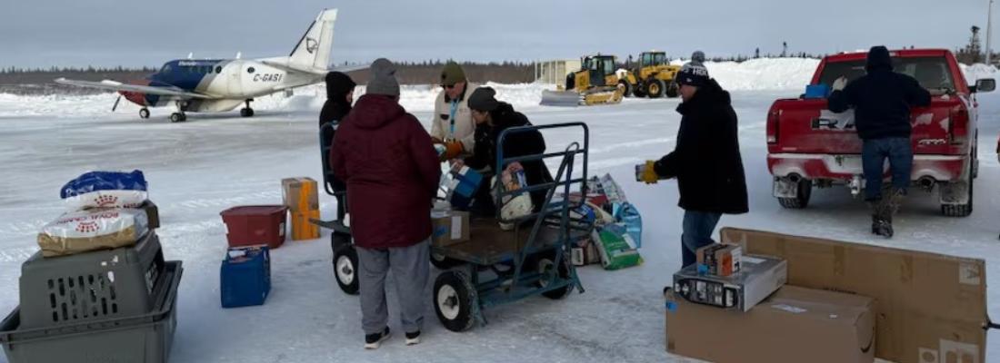 Residents of Kashechewan First Nation prepare to evacuate. (Photo via Facebook.)