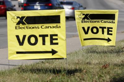 Election signage outside a polling station during the federal election, in Kingston, Ontario on September 20, 2021. (THE CANADIAN PRESS IMAGES/Lars Hagberg)