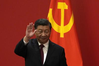 Chinese President Xi Jinping waves at an event to introduce new members of the Politburo Standing Committee at the Great Hall of the People in Beijing on October 23, 2022. (AP Photo/Andy Wong) 