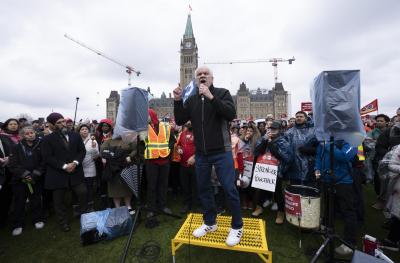 Public Service Alliance of Canada (PSAC) National President Chris Aylward speaks to striking members protesting on Parliament Hill, in Ottawa, on April 26, 2023. (THE CANADIAN PRESS/Adrian Wyld) 