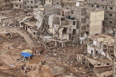 Rescuers and relatives of victims set up tents in front of collapsed buildings in Derna, Libya, on September 18, 2023. (AP Photo/Muhammad J. Elalwany, File) Rescuers and relatives of victims set up tents in front of collapsed buildings in Derna, Libya, on September 18, 2023. (AP Photo/Muhammad J. Elalwany, File)
