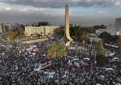 Thousands of Syrians celebrate the ousting of Bashar al-Assad's government in Damascus, Syria. (AP Photo/Hussein Malla) Thousands of Syrians celebrate the ousting of Bashar al-Assad's government in Damascus, Syria. (AP Photo/Hussein Malla)
