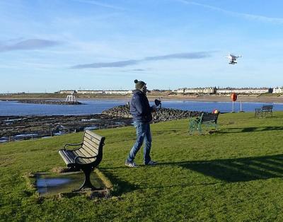 A drone enthusiast watches his craft take flight. (Photo: Russel Wills, CC BY-SA 2.0, via Wikimedia Commons) A drone enthusiast watches his craft take flight. (Photo: Russel Wills, CC BY-SA 2.0, via Wikimedia Commons)