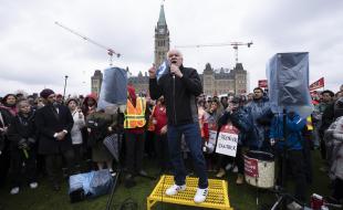 Public Service Alliance of Canada (PSAC) National President Chris Aylward speaks to striking members protesting on Parliament Hill, in Ottawa, on April 26, 2023. (THE CANADIAN PRESS/Adrian Wyld) 