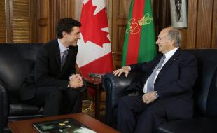 The Aga Khan (right) with Prime Minister Trudeau. (Photo via X.)