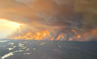 Wildfires rage in northern Manitoba. (Photo via X.)